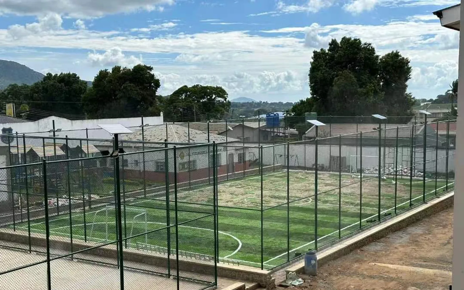 Elevated view of the enclosed small-sided football pitch in Malawi