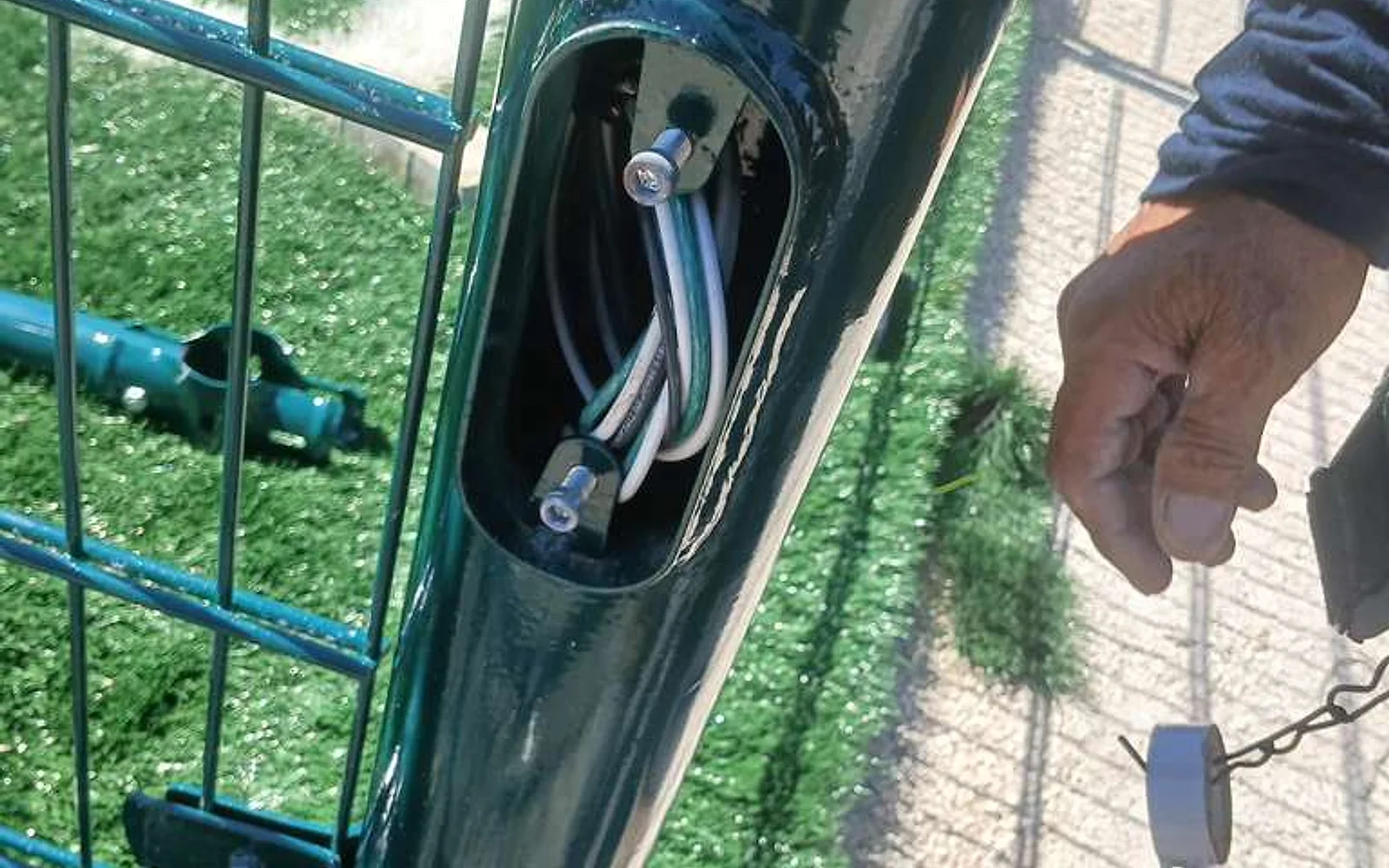 Concealed cable connection inside an enclosure post at the United States facility